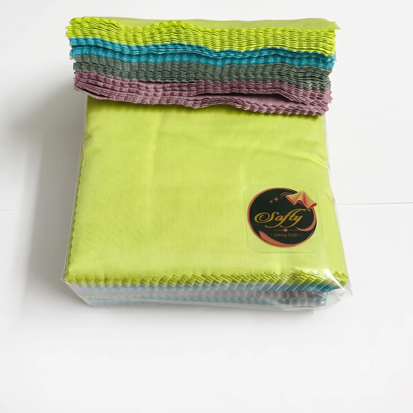 Softy brand lens cleaning cloths in bright green, blue, grey and lilac